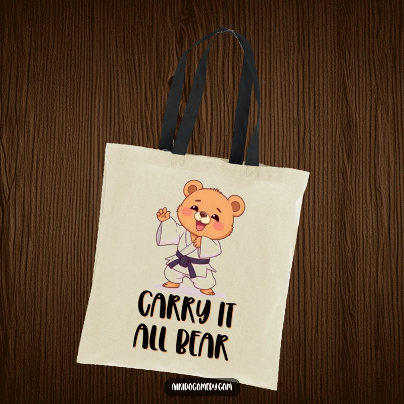 Funny bear cub in gi practicing Aikido, ready to pounce. A humorous tote bag, perfect as a funny gift.